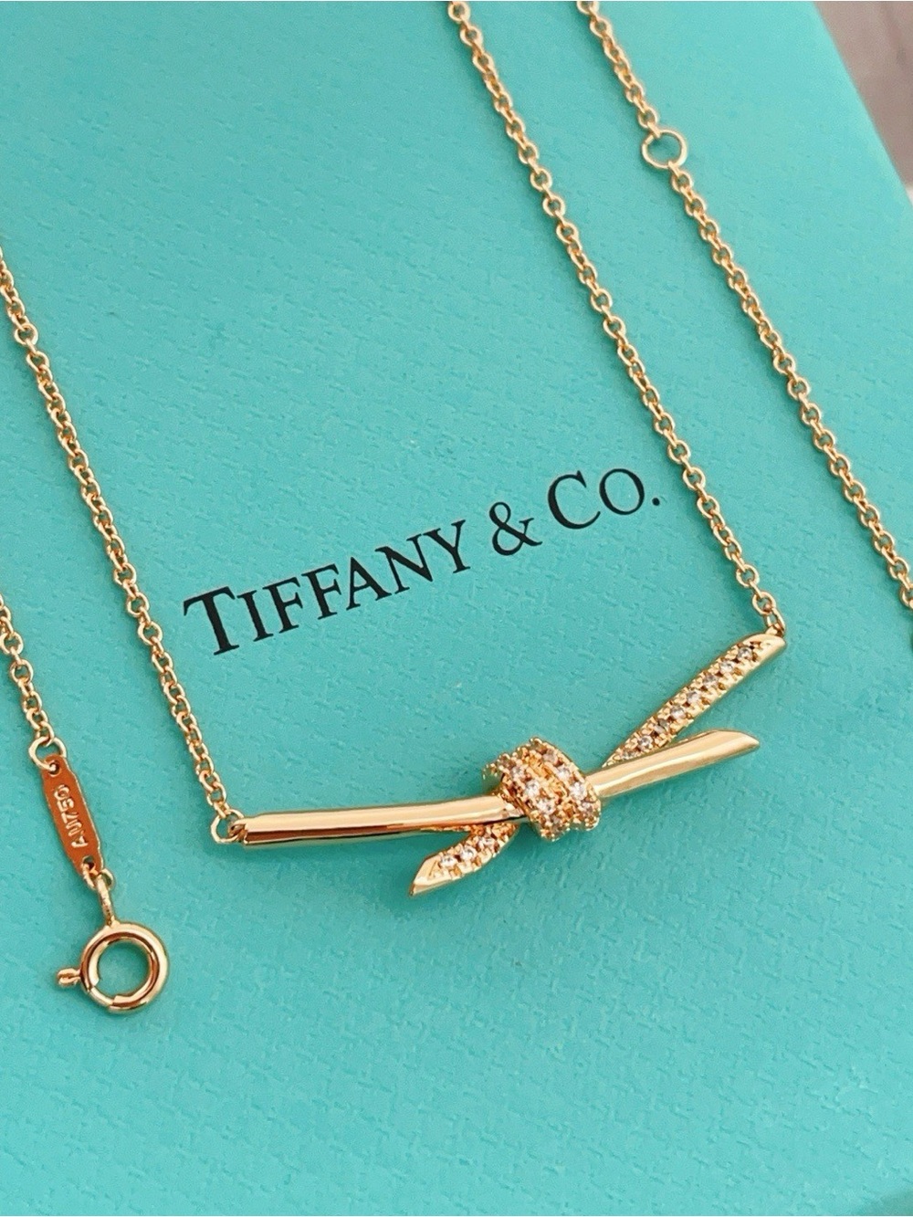 Tiffany & Co. Gold-Tone Knot Pendant Necklace with Pavé Diamonds